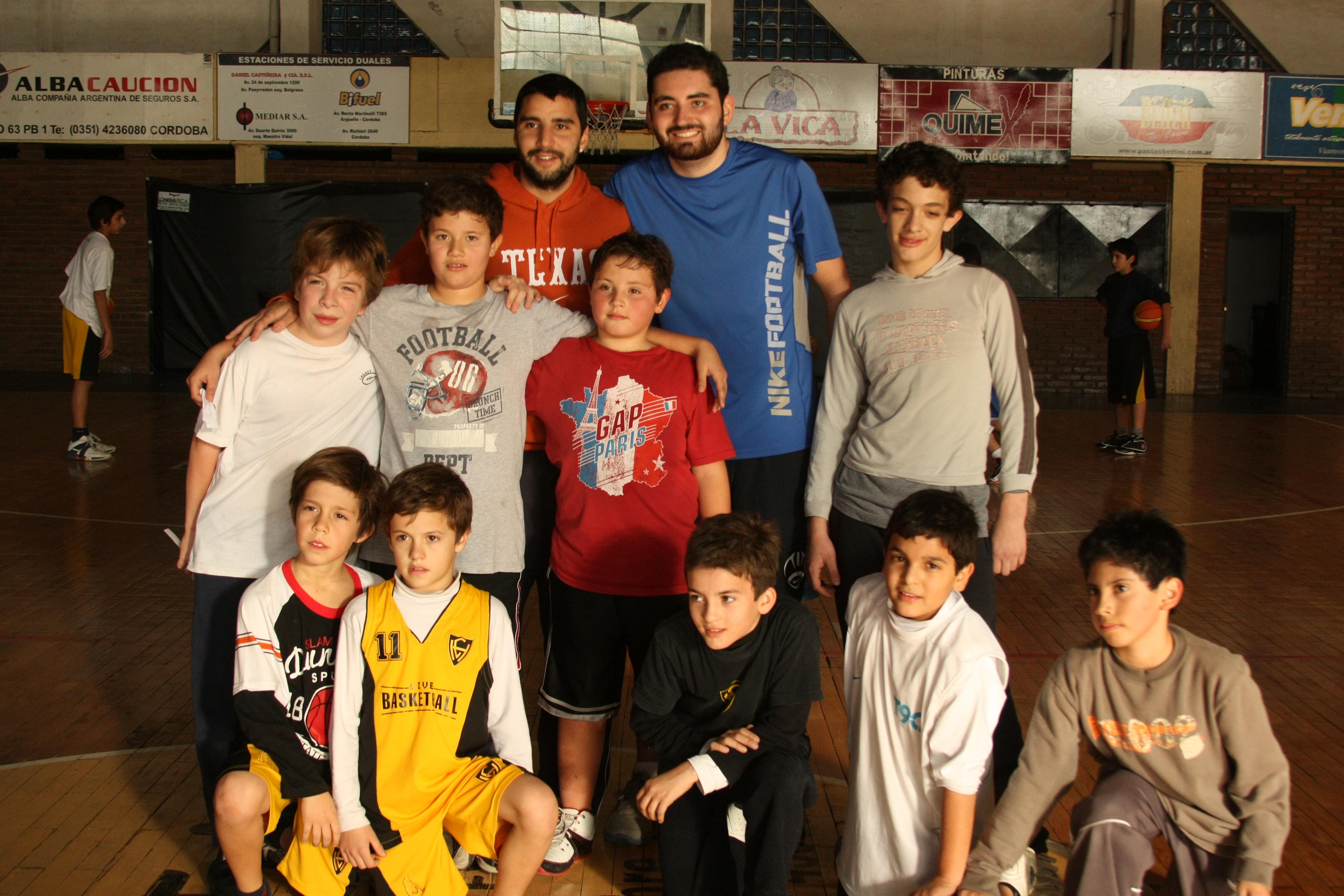 Projects Abroad sports volunteers coaching in Argentina pose with a local team Sports instructors pose with their team as part of their volunteer sports coaching in Argentina